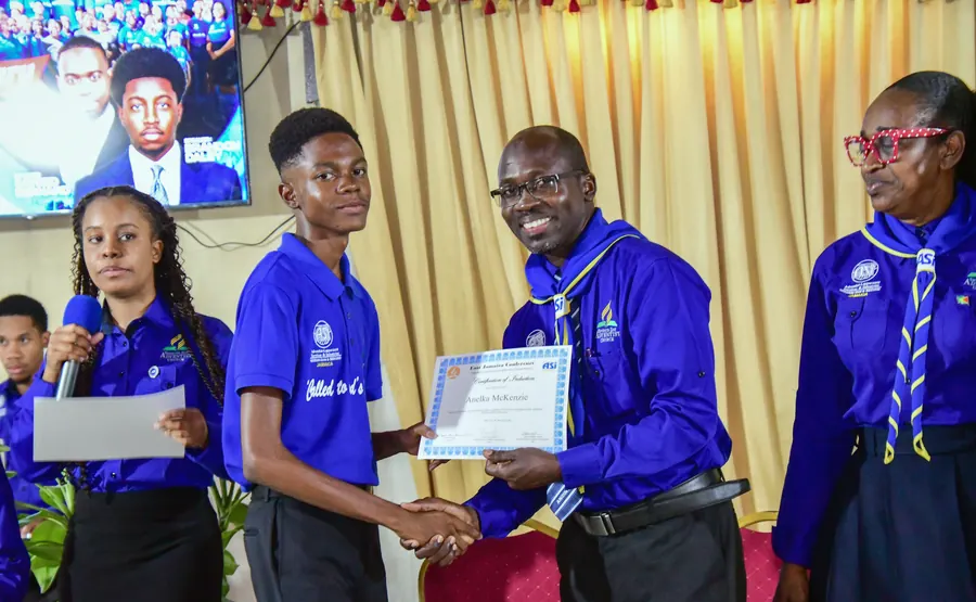 A missionary receives a certificate of induction